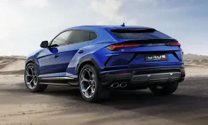 Niebieski Lamborghini Urus na pustyni. Sprawdź, jaka jest aktualna lamborghini urus cena i możliwości tego SUV-a.