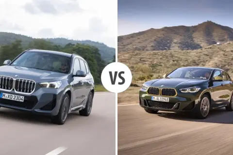 Dwa BMW X2 na drodze, jedno szare, drugie ciemnozielone, w scenerii górskiej.