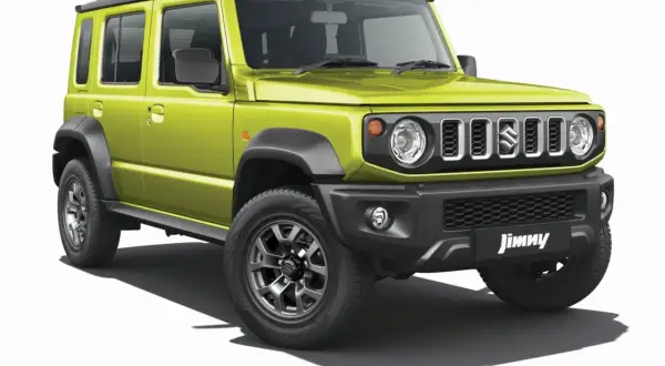 Jaskrawozielony Suzuki Jimny 5-drzwiowy, gotowy na przygody. Sprawdź jego cenę!