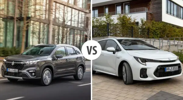 Szary Suzuki S-Cross na drodze obok białego auta.