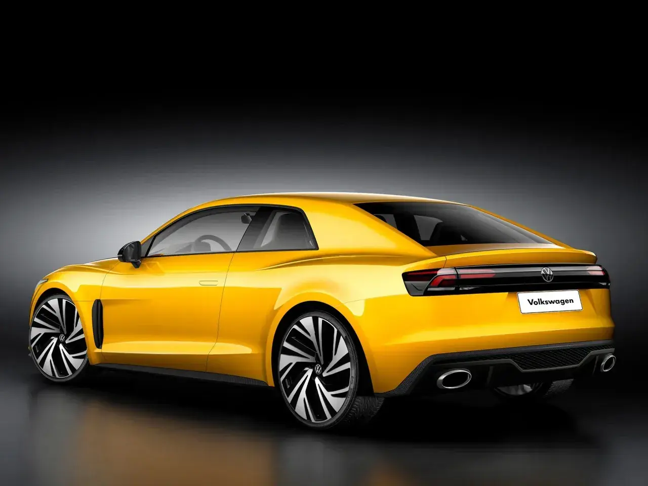 Żółty Volkswagen Corrado z nowoczesnym designem, sportowymi felgami i podwójnymi końcówkami wydechu.